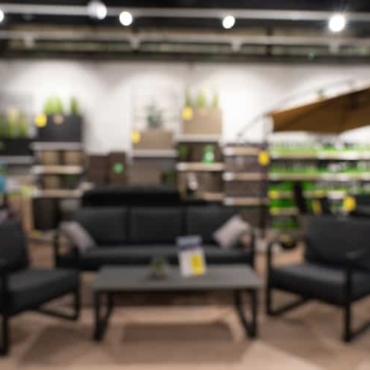 Abstract defocused blurred image of furniture store on sale