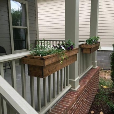 pine wood over railing planter box