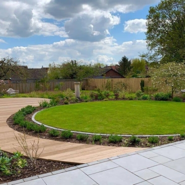 circular lawn and decked path